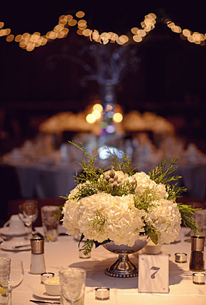 Wedding table decorations of flowers and lights - Paper Elephant, photography by Tegan Jae